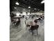 Spacious meeting room with tables and chairs for gatherings and community events at 7807 E Main St # Cc-98, Mesa, AZ 85207