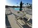Community pool area provides ample seating, lounge chairs, and umbrellas for residents' relaxation and enjoyment at 7807 E Main St # Cc-98, Mesa, AZ 85207