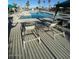 Community pool area offers comfortable seating, lounge chairs, and umbrellas for relaxing by the pool at 7807 E Main St # Cc-98, Mesa, AZ 85207