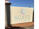 The Agave Village community signage displays the neighborhood's name and decorative succulent illustration at 7807 E Main St # Cc-98, Mesa, AZ 85207
