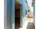 Exterior view of a structure featuring a window and a walkway at 8042 W Mariposa Dr, Phoenix, AZ 85033