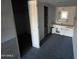 Bathroom featuring a closet, vanity with cabinets and a toilet at 8114 E Jackrabbit Rd, Scottsdale, AZ 85250