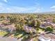 Idyllic neighborhood aerial view showcases mature trees, private pools, and a lovely single-Gathering home at 8604 S Oak St, Tempe, AZ 85284