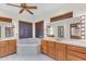 Luxurious bathroom featuring a soaking tub, double vanities, and tile flooring at 8604 S Oak St, Tempe, AZ 85284