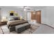 Bright bedroom with neutral tones, soft carpet, and ample closet space at 8604 S Oak St, Tempe, AZ 85284