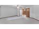 Spacious, bright bedroom featuring neutral carpet, ceiling fan, and multiple entryways at 8604 S Oak St, Tempe, AZ 85284