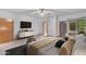 Comfortable bedroom with a view to the pool featuring a TV, and sitting area at 8604 S Oak St, Tempe, AZ 85284