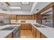 Well-lit kitchen with stainless steel appliances, double sinks, plentiful cabinets, and a skylight at 8604 S Oak St, Tempe, AZ 85284