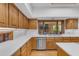 Spacious kitchen featuring stainless steel appliances, granite countertops, tile backsplash, and generous counter space at 8604 S Oak St, Tempe, AZ 85284