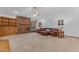 Comfortable living room features a cozy brick fireplace, built-in shelving, and a plush leather sofa at 8604 S Oak St, Tempe, AZ 85284