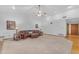 Bright living room with neutral colors, tile floors, and ample space at 8604 S Oak St, Tempe, AZ 85284