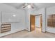 Room with large whiteboard, and a wooden shelf with an open door at 8604 S Oak St, Tempe, AZ 85284