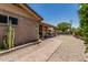 Charming backyard featuring a covered patio and low-maintenance landscaping at 8620 E Sells Dr, Scottsdale, AZ 85251