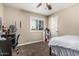 Cozy bedroom with a neutral color scheme, plush carpet, shuttered windows, and comfortable furnishings at 8620 E Sells Dr, Scottsdale, AZ 85251