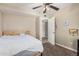 Comfortable bedroom features plush carpet, a bed with cozy blanket, and neutral color palette at 8620 E Sells Dr, Scottsdale, AZ 85251