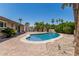 Beautiful pool area with lush landscaping and a cozy patio, perfect for summer days at 8620 E Sells Dr, Scottsdale, AZ 85251