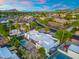Aerial view of a beautiful home in a desert city with rolling hills at 908 W Pershing Ave, Phoenix, AZ 85029