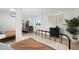 Spacious bedroom leading to a living room, and a sliding door to a balcony at 908 W Pershing Ave, Phoenix, AZ 85029