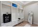 Well-organized closet with built-in shelving, drawers, and a full-length mirror at 908 W Pershing Ave, Phoenix, AZ 85029