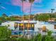 Stunning exterior with a private pool, mature landscaping, and a pergola for outdoor entertaining at 908 W Pershing Ave, Phoenix, AZ 85029