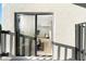 View from patio through the sliding door to the seating area and bedroom at 908 W Pershing Ave, Phoenix, AZ 85029