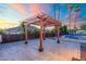 Pergola covered patio leading to beautiful pool and desert landscape at 908 W Pershing Ave, Phoenix, AZ 85029
