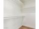 Walk-in closet with shelving, ready for easy organization and maximizing storage capacity at 967 E Hearne Way, Gilbert, AZ 85234