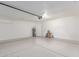 Spacious garage with epoxy flooring, ample storage, and utility connections, designed for functionality and convenience at 967 E Hearne Way, Gilbert, AZ 85234