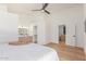 Bright main bedroom with ensuite bathroom and walk-in closet access creates a luxurious private space at 967 E Hearne Way, Gilbert, AZ 85234