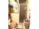 Modest bathroom featuring a walk-in shower, toilet, vanity and mirror at 1231 E Avila Ave, Casa Grande, AZ 85122