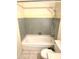 Bathroom with a white tub, tile surround, and tile flooring at 1231 E Avila Ave, Casa Grande, AZ 85122