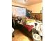 This bedroom is brightly lit by a sunny window and a bedside lamp at 1231 E Avila Ave, Casa Grande, AZ 85122