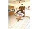Dining area with tile flooring, built-in cabinets, and a table with seating at 1231 E Avila Ave, Casa Grande, AZ 85122