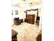 A living room featuring a rocking chair, carpet and vintage wood furnishings at 1231 E Avila Ave, Casa Grande, AZ 85122