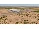 A sweeping aerial view features an industrial processing facility set against a desert environment at 1374 E 10Th Pl, Casa Grande, AZ 85122