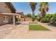 Spacious, low-maintenance backyard featuring decorative pavers and artificial turf for year-round enjoyment at 1374 E 10Th Pl, Casa Grande, AZ 85122