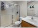 Bathroom with a shower and tub combo, wood vanity, and tile floors at 1374 E 10Th Pl, Casa Grande, AZ 85122