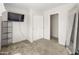 Cozy bedroom with carpet flooring, closet and a view to other areas at 1374 E 10Th Pl, Casa Grande, AZ 85122