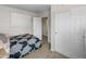 Bedroom with closet, natural light, and carpeted floors at 1374 E 10Th Pl, Casa Grande, AZ 85122