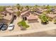 Charming single-Gathering home boasts a two-car garage, desert landscaping, and a welcoming entrance at 1374 E 10Th Pl, Casa Grande, AZ 85122