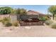 The Acacia Landing community sign is nestled in a rock display, enhanced by desert plants and gravel at 1374 E 10Th Pl, Casa Grande, AZ 85122
