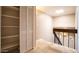 Hallway at the top of the stairs featuring tile floors and a large closet at 1401 E Puget Ave # 24, Phoenix, AZ 85020
