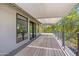 Open back deck overlooking the yard features an overhang and plenty of natural light at 1419 E Las Palmaritas Dr, Phoenix, AZ 85020