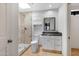 Clean, modern bathroom featuring a glass shower, granite counters, updated vanity and sink at 1419 E Las Palmaritas Dr, Phoenix, AZ 85020