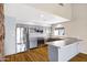 Stylish kitchen featuring stainless steel appliances, stone countertops, updated subway tile and sleek cabinets at 1419 E Las Palmaritas Dr, Phoenix, AZ 85020