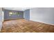 Spacious room features tile flooring, gray walls, natural light, and plenty of space at 1419 E Las Palmaritas Dr, Phoenix, AZ 85020