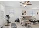 A Gathering living space with neutral colors, and a ceiling fan at 14360 W Pershing St, Surprise, AZ 85379
