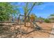 Large backyard featuring a playset and trampoline, perfect for Gathering fun and outdoor activities at 14808 N 37Th Way, Phoenix, AZ 85032