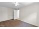 Comfortable bedroom features carpet and a ceiling fan at 14808 N 37Th Way, Phoenix, AZ 85032