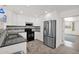 Updated kitchen featuring white cabinetry, stainless steel appliances, and modern finishes at 14808 N 37Th Way, Phoenix, AZ 85032